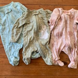 Carter’s two-way zip long sleeve newborn onesies